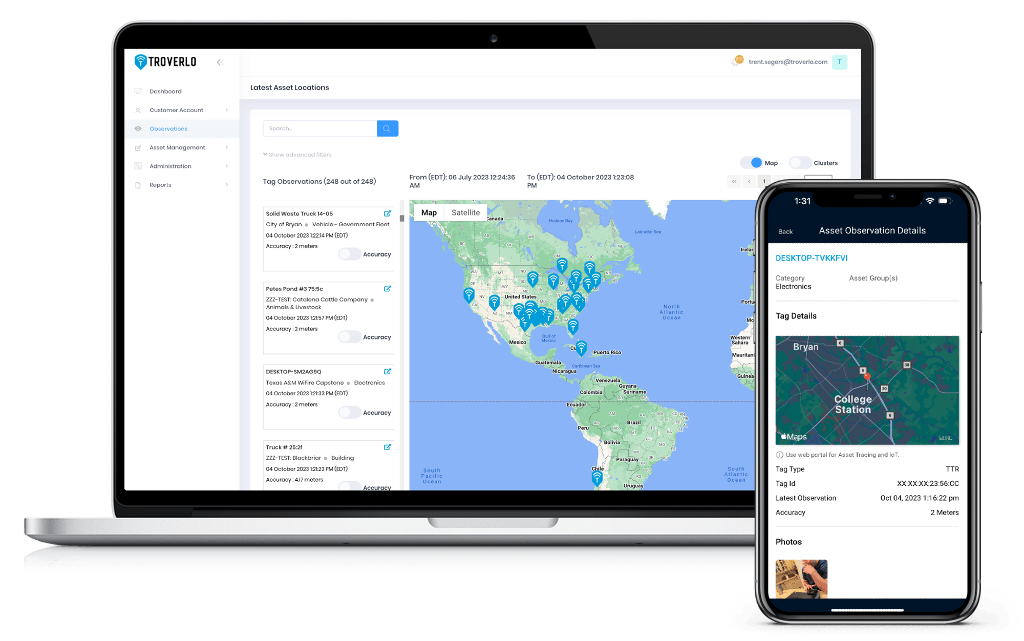 A laptop and tablet with the Troverlo Web Portal and App displaying a map of the world with asset points